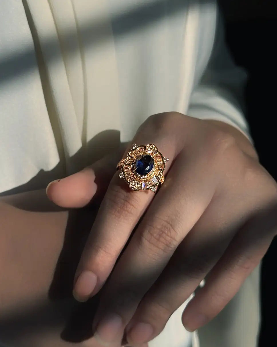 Turtle inspired ring with blue diamond